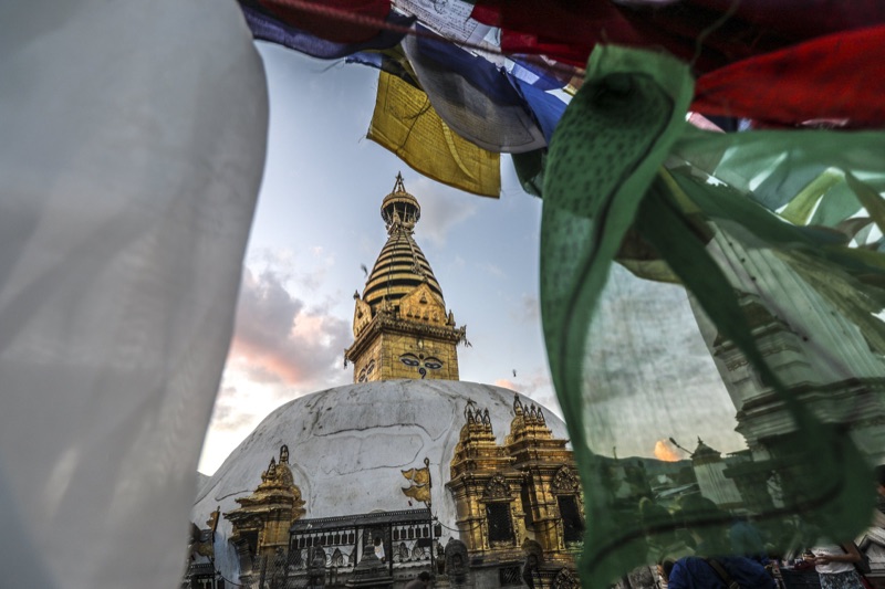 Swayambhunath stupa framed by prayer flags, Kathmandu, Nepal
